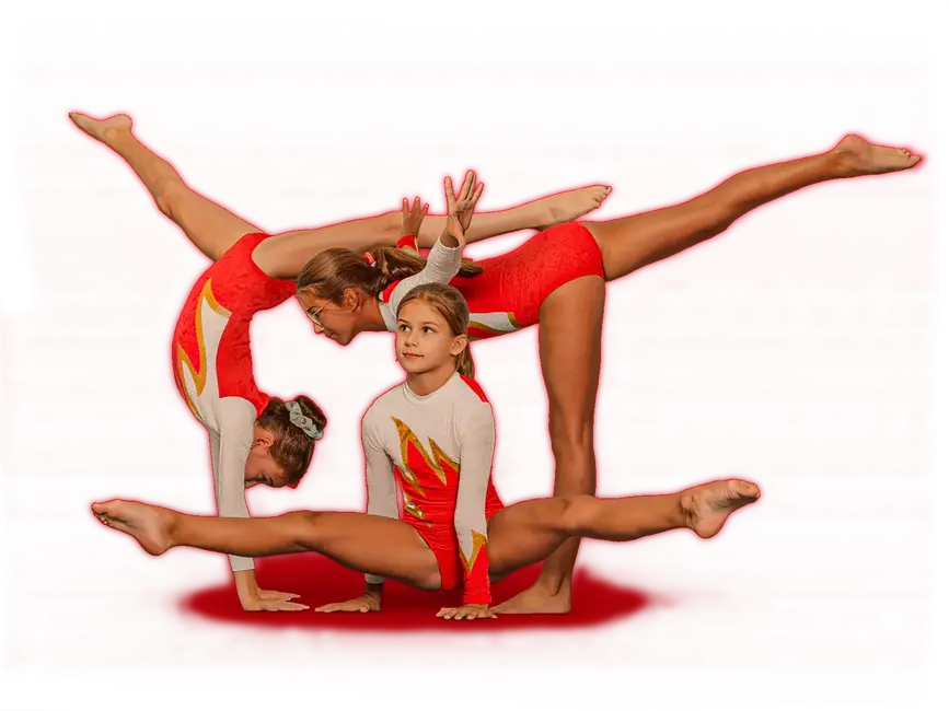 Drei Turnerinnen der Turngemeinde Landshut zeigen eine beeindruckende Akrobatikpose auf rotem Hintergrund.