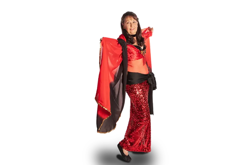 Eine Frau tanzt in einem funkelnden, orientalischen Kostüm, symbolisch für den Sportverein Turngemeinde Landshut.