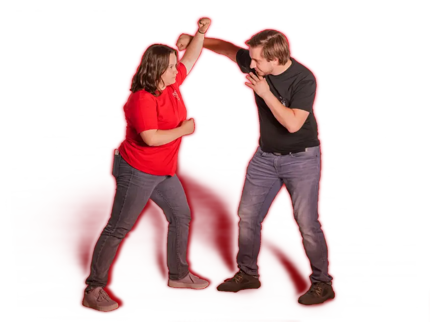 Zwei Personen üben Selbstverteidigungstechniken gegen Gewalt prävention im Sportverein Turngemeinde Landshut.